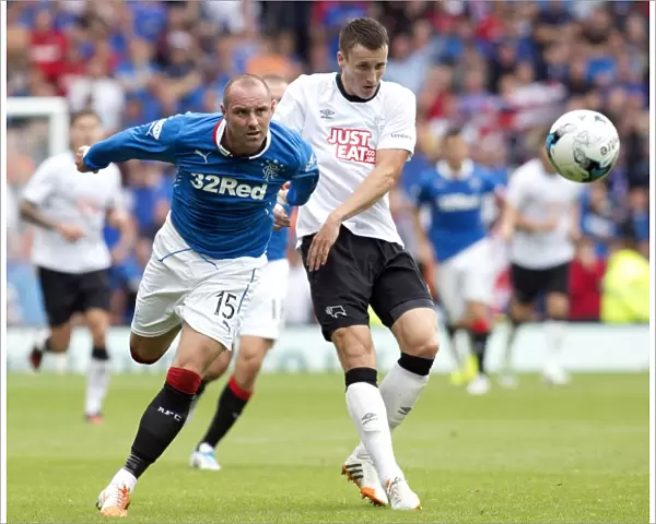 Rangers Kris Boyd Fights for Possession in Scottish Cup Champions Clash against Derby County (Friendly)
