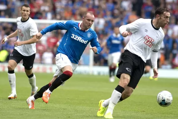 Rangers vs Derby County: Kris Boyd's Intense Battle for the Ball - Scottish Cup Champions Clash (Friendly Match)