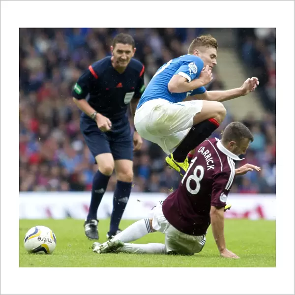 Leap of Faith: Rangers Macleod Soars Over Hearts Carrick in SPFL Championship Clash at Ibrox Stadium