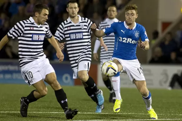 Intense Clash: Rangers vs Queens Park in Scottish League Cup Round One at Excelsior Stadium - Macleod vs Fraser