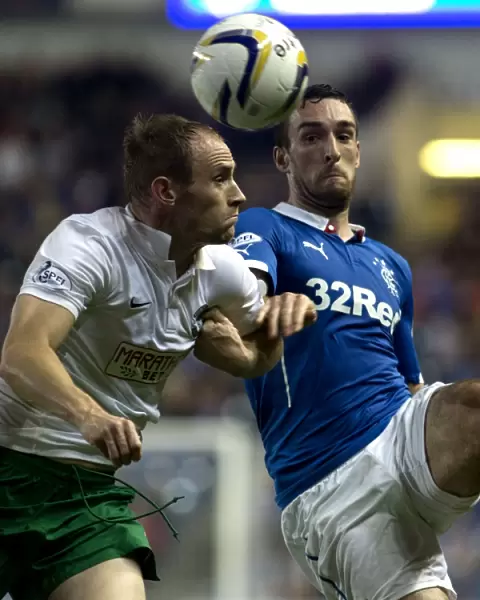 Intense Rivalry: Lee Wallace Stands Firm Against David Gray at Ibrox Stadium - SPFL Championship Clash