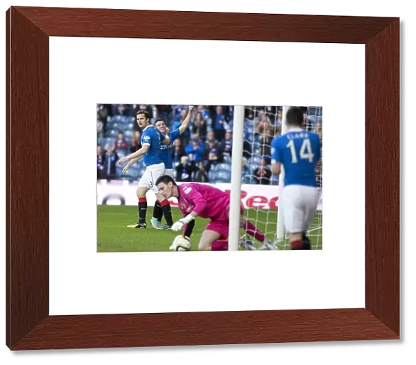 Rangers Football Club: Jon Daly and Fraser Aird's Jubilant Moment after Scoring at Ibrox Stadium - SPFL Championship: Rangers vs Raith Rovers