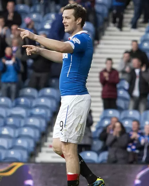 Rangers Jon Daly Doubles Up: Celebrating Two Goals at Ibrox in the SPFL Championship Against Raith Rovers