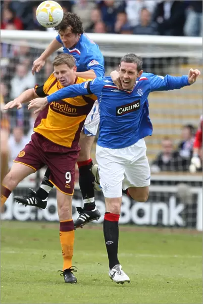 David Weir and Christian Dailly vs. Chris Porter: A Fierce Rivalry at Fir Park - Motherwell 1-1 Rangers, Clydesdale Bank Premier League
