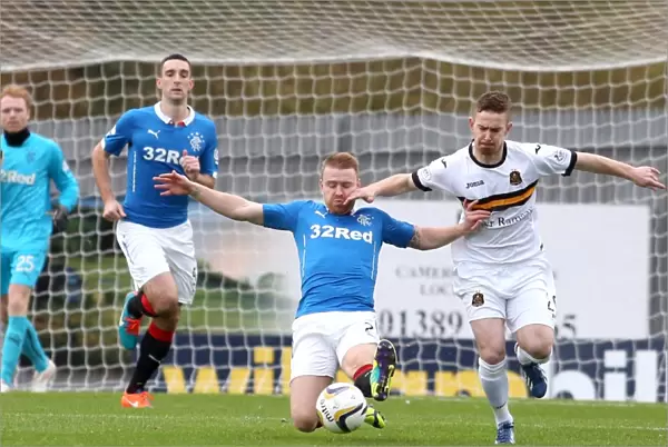 Rangers Stevie Smith Tackles Archie Campbell in Intense Scottish Cup Clash
