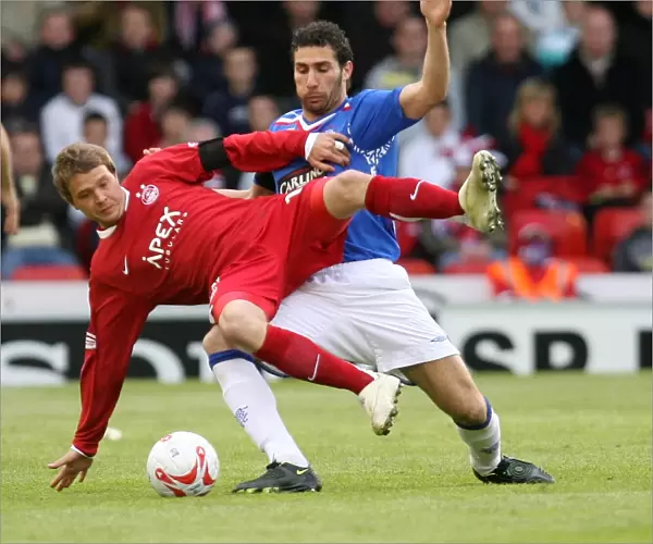 Cuellar vs Millar: Aberdeen's Triumph over Rangers in the Clydesdale Bank Premier League (2-0)