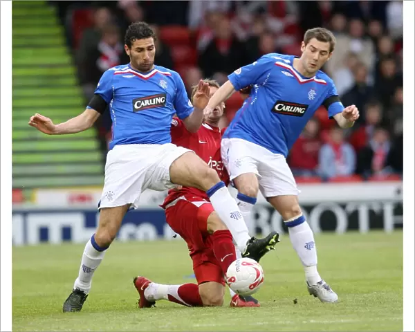 Cuellar and Thomson's Defensive Stand: Aberdeen's 2-0 Victory Over Rangers (Clydesdale Bank Premier League)