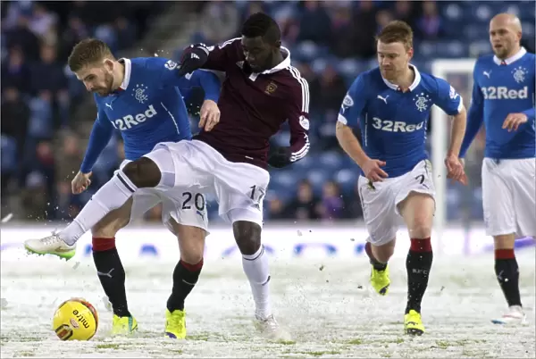 Rangers vs Hearts: Clash at Ibrox - A Battle Between Kyle Hutton and Prince Buaben in the Scottish Championship