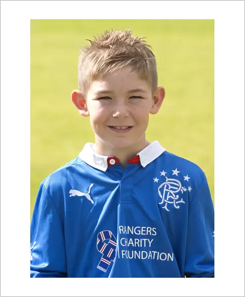 Rangers U12: Celebrating Scottish Cup Victory with Coach Robbie Fraser at Murray Park