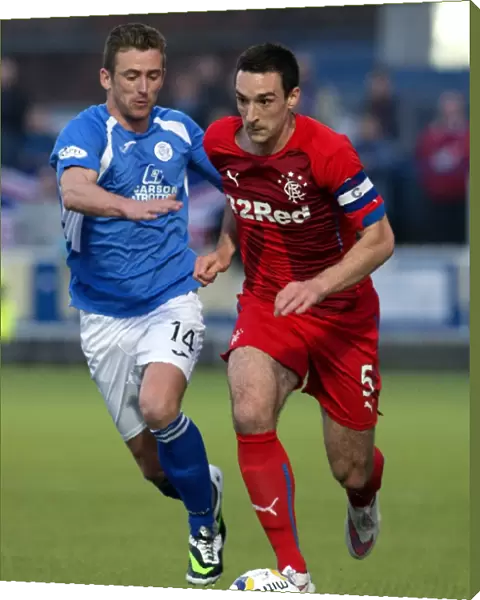 Clash at Palmerston Park: Lee Wallace vs Stephen McKenna in Scottish Championship Action - Champions Collide