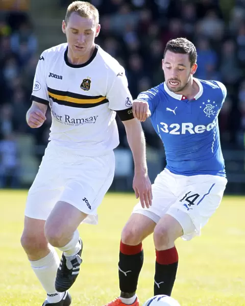 Rangers vs Dumbarton: A Clash Between Nicky Clark and Andy Graham in the Scottish Championship