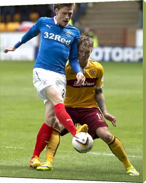 Intense Rivalry: Marius Zaliukas vs. Lee Erwin in the Scottish Premiership Play-Off Final at Fir Park