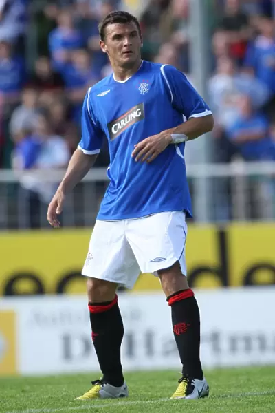 Lee McCulloch Scores the Winning Goal: Rangers FC Triumphs Over SC Preussen Münster (1-0)