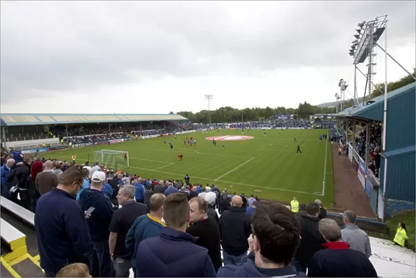 Rangers Fans Celebrate Championship Victory at Cappielow Park