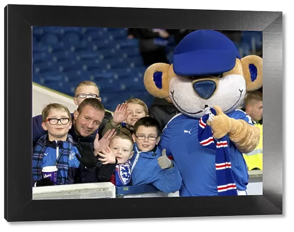 Roaring Rampant: Rangers FC's Broxi Bear and Passionate Fans at Ibrox Stadium during Ladbrokes Championship Match against Greenock Morton