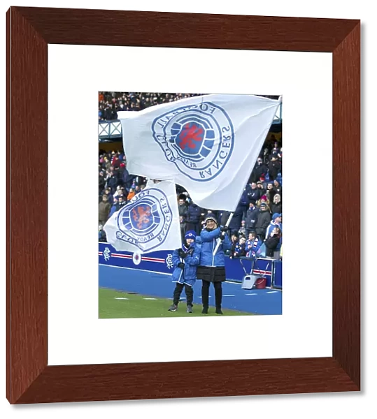 Glasgow's Pride Unfurled: Rangers Flag Bearers Celebrate Scottish Cup Victory at Ibrox Stadium (2003)