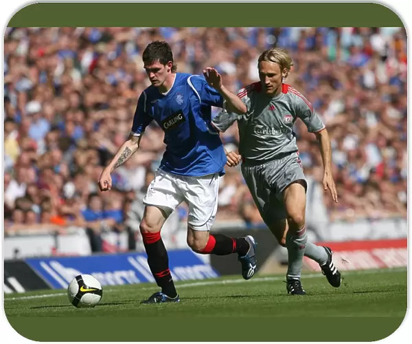 Intense Rivalry: Hyypia vs. Lafferty - Liverpool's Dominant 4-0 Victory Over Rangers