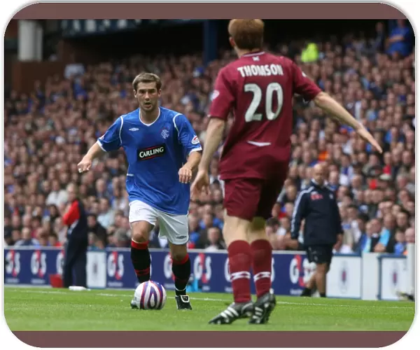 Ibrox Rivalry: Thomson Brothers Face Off in Rangers 2-0 Clydesdale Bank Premier League Triumph
