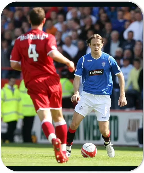 Rangers Sasa Papac Faces Off Against Aberdeen: A 1-1 Clydesdale Bank Premier League Stalemate at Pittodrie