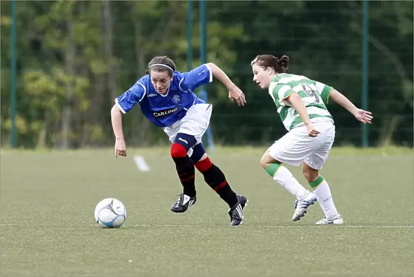 Jenna Ross Outpaces Stephanie Mallon: A Moment of Excitement in the Celtic vs Rangers Ladies Soccer Match
