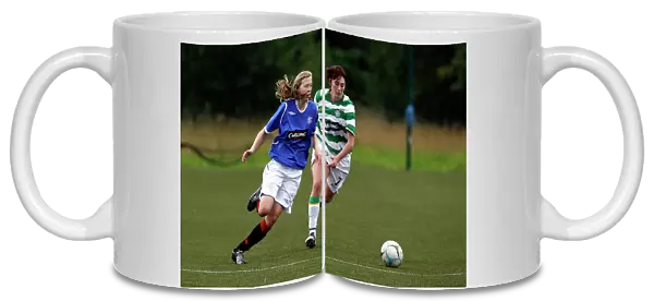 A Moment of Action: Lisa Swanson Slips Past Lisa Quigley in the Celtic vs Rangers Ladies Match at Lennoxtown, Glasgow (24-08-08)