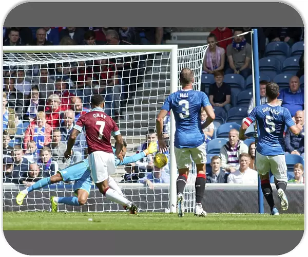 Andre Gray Scores His Second Penalty for Burnley at Ibrox Stadium