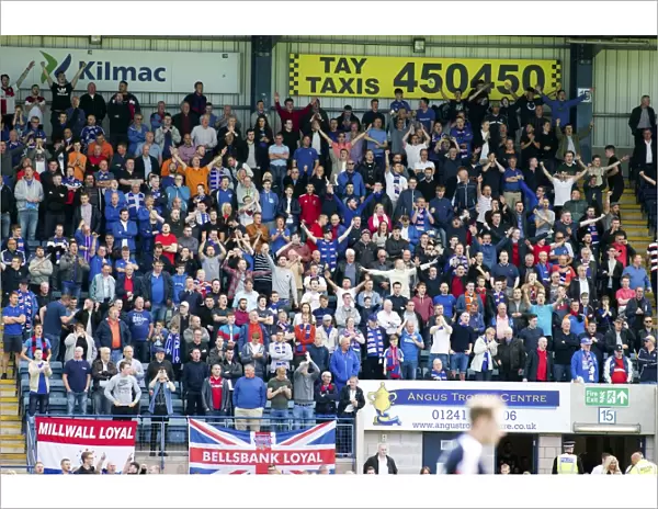 Rangers Fans Celebrate Scottish Premiership Victory at Dens Park: A Historic Moment Against Dundee, Scottish Cup Champions 2003