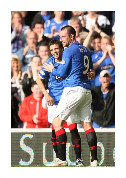 Rangers Football Club: Kris Boyd and Nacho Novo's Unforgettable Moment - Celebrating the Second Goal Against Motherwell at Ibrox