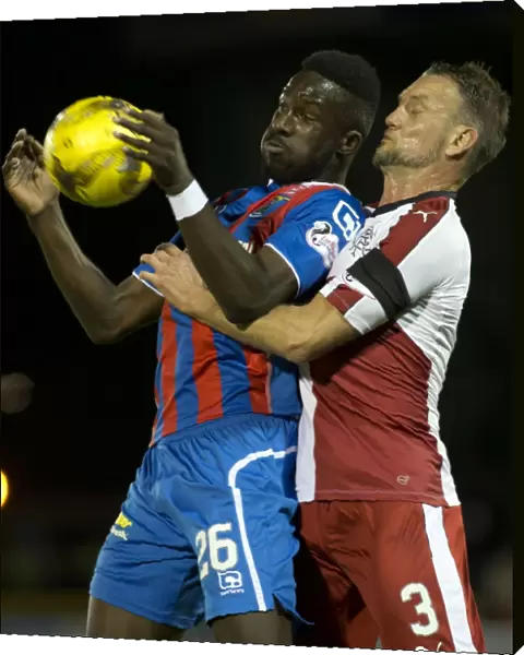 Clash at Caledonian Stadium: Hill and Doumbouya Go Head-to-Head in Ladbrokes Premiership Match