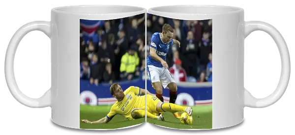 Rangers vs St Johnstone: Lee Hodson vs Liam Craig - Intense Tackle in Ladbrokes Premiership at Ibrox Stadium