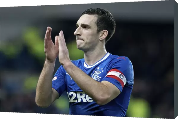 Rangers Captain Lee Wallace Salutes Adoring Fans Amidst the Excitement of Rangers vs. Heart of Midlothian at Ibrox Stadium