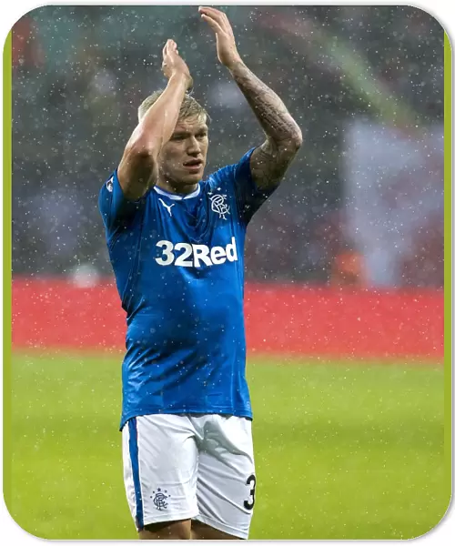 Rangers Martyn Waghorn Salutes Fans: Triumphant Moment at Red Bull Arena during RB Leipzig Friendly