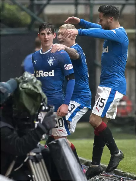 Rangers Emerson Hyndman Scores and Celebrates with Team Mates in Motherwell Victory