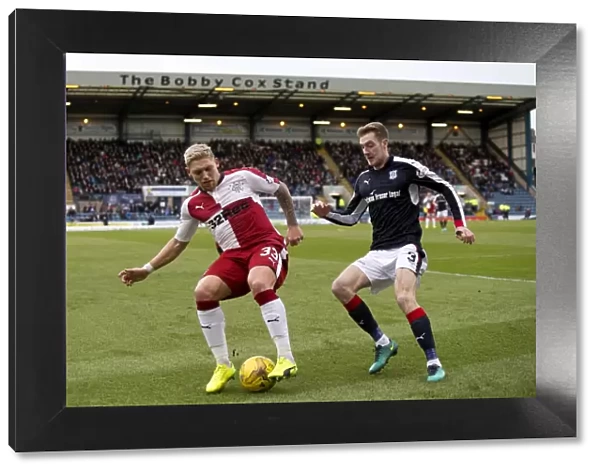 Rangers Waghorn Shields Ball from Holt in Intense Ladbrokes Premiership Clash at Dens Park