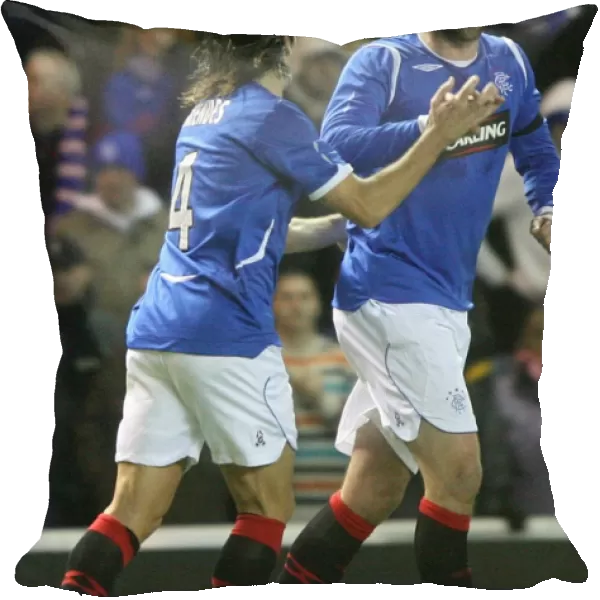 Rangers Kris Boyd and Pedro Mendes: A Dynamic Duo Celebrating Goals in the Co-operative Insurance Cup (Rangers 2-0 Hamilton)