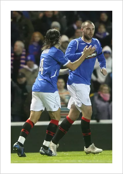 Rangers Kris Boyd and Pedro Mendes: A Dynamic Duo Celebrating Goals in the Co-operative Insurance Cup (Rangers 2-0 Hamilton)