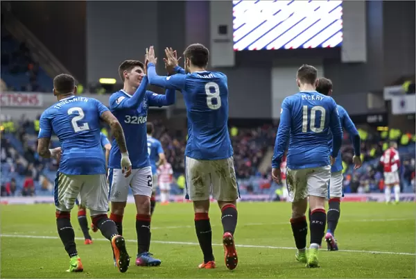 Rangers Toral and Hyndman: Unstoppable Duo Celebrates Goal in Scottish Cup Quarterfinal at Ibrox Stadium