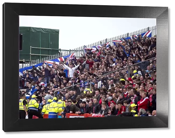 Rangers Fans Triumphant Celebration at Pittodrie Stadium