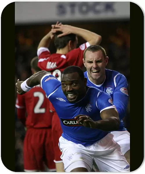 Rangers Darcheville and Boyd: Celebrating a Winning Goal Against Aberdeen (2-0)