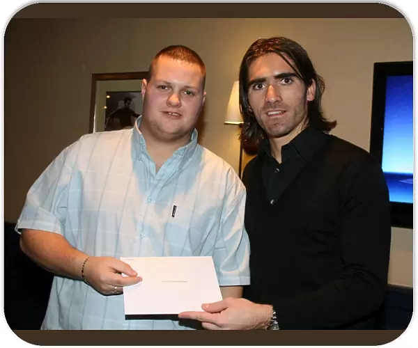 Rangers Football Club: Pedro Mendes Awards Fan with Charity Race Night Prize (2008)