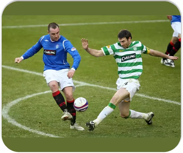 Celtic Takes the Lead: Kris Boyd vs Stephen McManus at Ibrox (Rangers 0-1 Celtic)