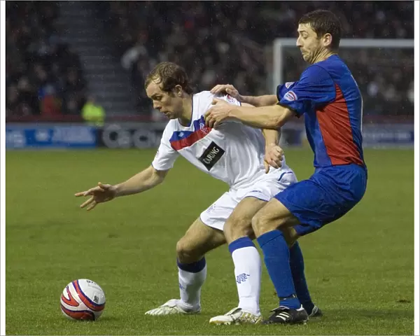 Rangers Steven Whittaker Defends Against Inverness Roy McBain in Clydesdale Bank Scottish Premier League Match