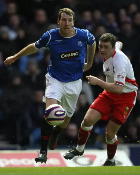 Rangers Kirk Broadfoot Celebrates Glory: 3-1 Win Over Falkirk in Clydesdale Bank Premier League