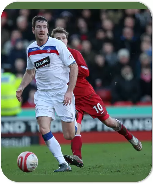 0-0 Stalemate at Pittodrie Stadium: Aberdeen vs Rangers - Clydesdale Bank Premier League (Kirk Broadfoot, Rangers)