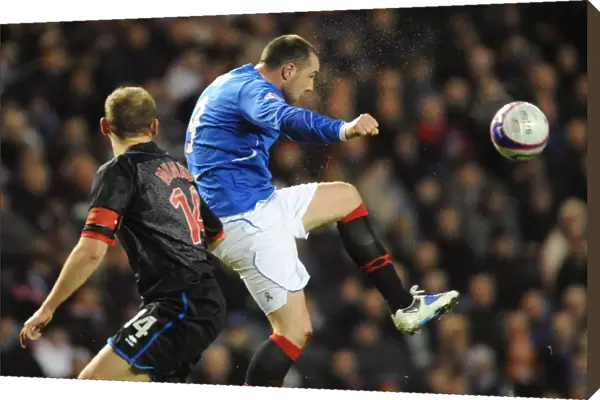 Kris Boyd vs Grant Munro: A Pivotal Moment in the Rangers vs Inverness 1-0 Clydesdale Bank Premier League Clash