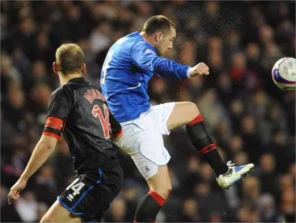 Kris Boyd vs Grant Munro: A Pivotal Moment in the Rangers vs Inverness 1-0 Clydesdale Bank Premier League Clash