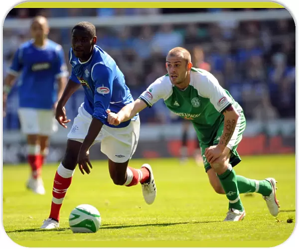 Thrilling 2-3 Rangers Victory: Maurice Edu vs. Steven Fletcher Clash in Clydesdale Bank Premier League