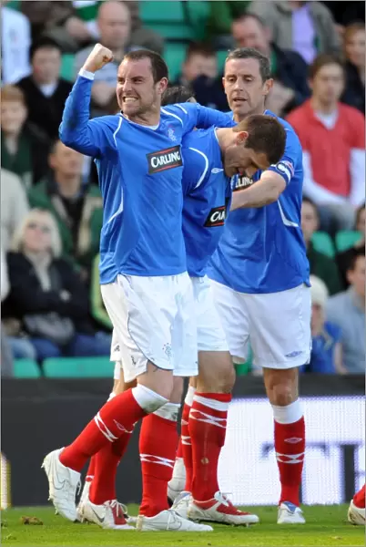 Rangers Thrilling Comeback: Velicka and Teammates Celebrate 3-2 Victory Over Hibernian in the Clydesdale Bank Premier League