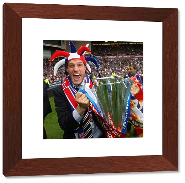 Rangers Football Club: Andrius Velicka Celebrates 2008-09 Clydesdale Bank Premier League Championship Title with the League Trophy