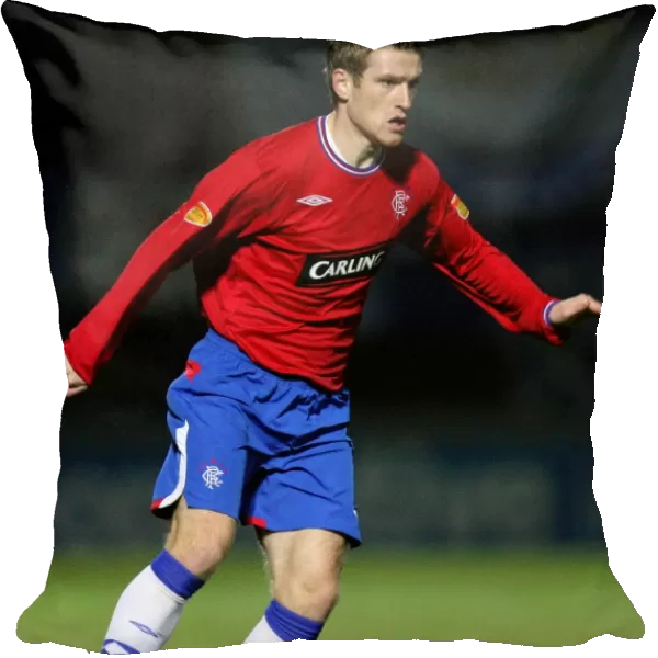 Rangers Steven Davis Scores the Decisive Goal: Rangers Triumph Over Queen of the South in the Co-operative Insurance Cup (1-2) at Palmerston Park